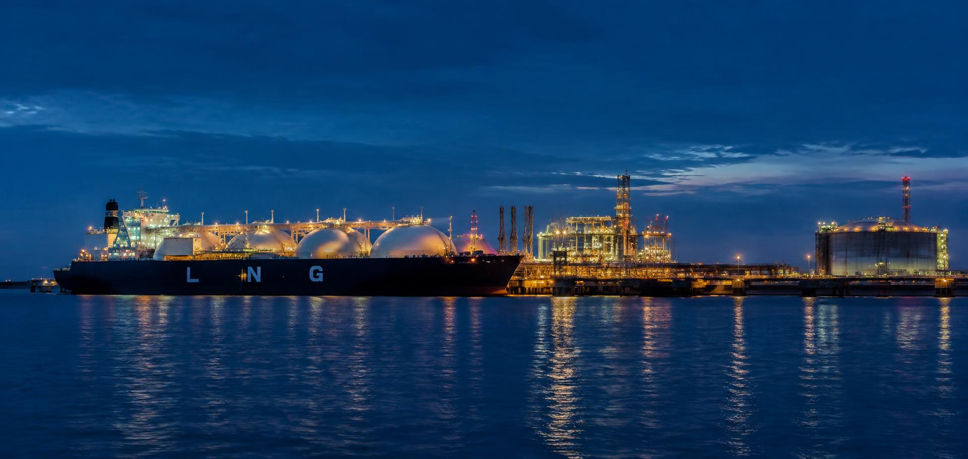 LNG carrier at an energy terminal at twilight